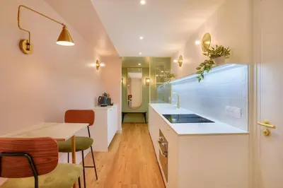 Cuisine ou kitchenette dans l'établissement La vie en Rose - 2 chambres doubles