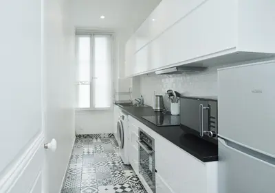 Cuisine ou kitchenette dans l'établissement -Votre nid familial parisien - Batignolles