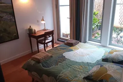 Un ou plusieurs lits dans un hébergement de l'établissement Chambre d'ALO