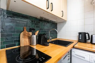 Cuisine ou kitchenette dans l'établissement Appartement Feydeau - Welkeys