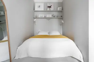 Un ou plusieurs lits dans un hébergement de l'établissement Luxe à Boulogne : Appart. Haut Standing