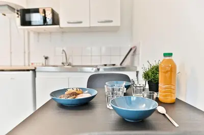 Cuisine ou kitchenette dans l'établissement Appartement proche Mairie 10ème arrondissement