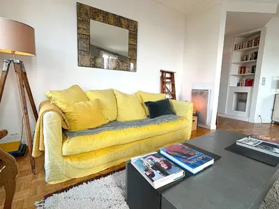 Coin salon dans l'établissement L'appartement Poulbot