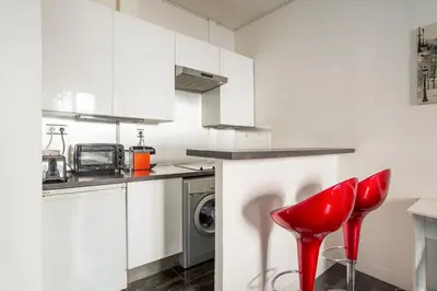 Cuisine ou kitchenette dans l'établissement Paris St Germain Luxembourg