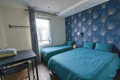 Un ou plusieurs lits dans un hébergement de l'établissement Private Room in Coliving - Paris 10min - by Cosynousvoici