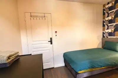 Un ou plusieurs lits dans un hébergement de l'établissement Private Room in Coliving - Paris 10min - by Cosynousvoici
