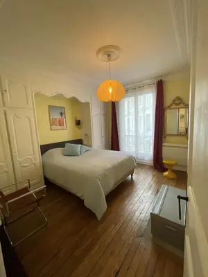 Un ou plusieurs lits dans un hébergement de l'établissement Paris Le Marais & Central Large Big Spacious Charming Parisian flat
