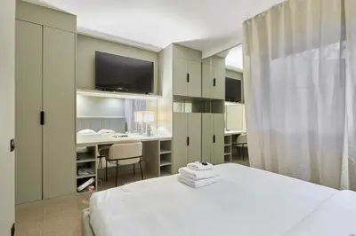 Un ou plusieurs lits dans un hébergement de l'établissement Apartment Père Lachaise by Studio prestige