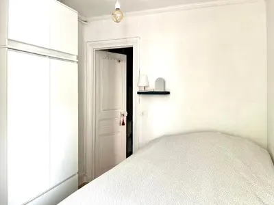 Un ou plusieurs lits dans un hébergement de l'établissement Best flat in Paris