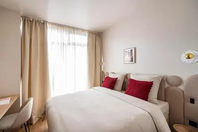 Un ou plusieurs lits dans un hébergement de l'établissement The Olympia Suite - Duke Housing
