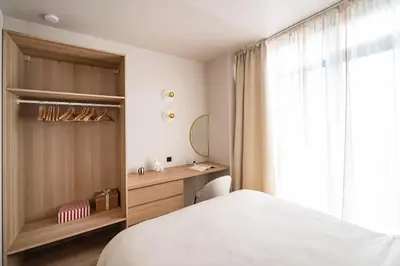 Un ou plusieurs lits dans un hébergement de l'établissement The Olympia Suite - Duke Housing