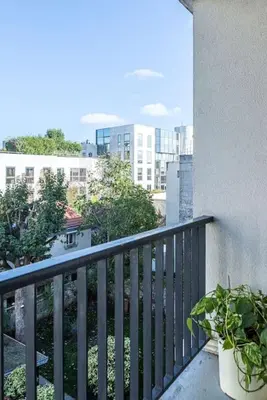 Balcon ou terrasse dans l'établissement L'ESCUDIER Appartement calme proche Rolland Garros avec vue panoramique et parking
