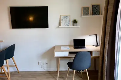 Télévision ou salle de divertissement dans l'établissement Studio pour séjours d’affaires à La Défense