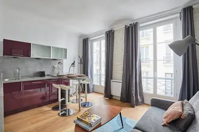 Cuisine ou kitchenette dans l'établissement Apartment Center of Paris by Studio prestige