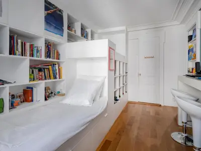Un ou plusieurs lits dans un hébergement de l'établissement Paris Center - Haussmann Elegant Residence