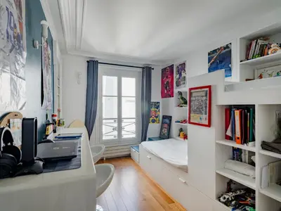 Télévision ou salle de divertissement dans l'établissement Paris Center - Haussmann Elegant Residence