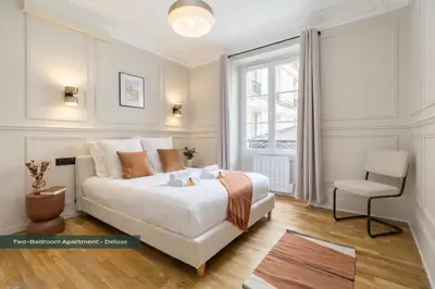 Un ou plusieurs lits dans un hébergement de l'établissement PoeticStay - Saint Lazare
