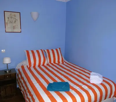 Un ou plusieurs lits dans un hébergement de l'établissement Bergère Opéra Trévise - 2 connecting rooms with private bathroom and 1 study room - 35 m2