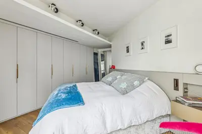 Un ou plusieurs lits dans un hébergement de l'établissement Quai des Célestins 1bdr by B'Your Home