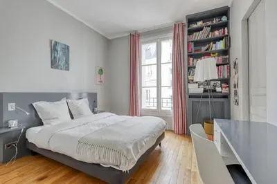 Un ou plusieurs lits dans un hébergement de l'établissement Wonderful & large flat in the 7th - Eiffel Tower
