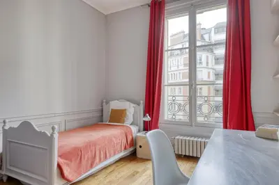 Un ou plusieurs lits dans un hébergement de l'établissement Wonderful & large flat in the 7th - Eiffel Tower