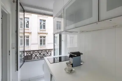Coin salon dans l'établissement Le LONGCHAMP Paris 16 ème, New and perfectly located apartment
