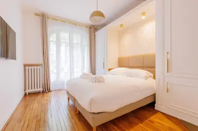 Un ou plusieurs lits dans un hébergement de l'établissement Charming apartment - 2BR-4P - Beaugrenelle