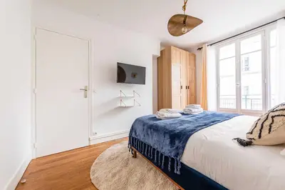 Un ou plusieurs lits dans un hébergement de l'établissement Bright & charming apartment - 1BR-4P - Montmartre