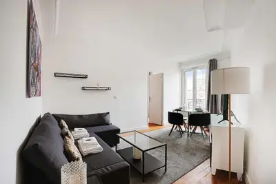 Coin salon dans l'établissement Chic apartment - 1BR-4P - Next to Paris