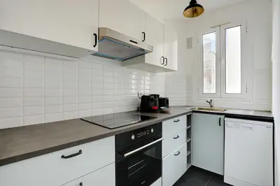 Cuisine ou kitchenette dans l'établissement Chic apartment - 1BR-4P - Next to Paris