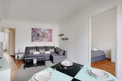 Coin salon dans l'établissement Chic apartment - 1BR-4P - Next to Paris