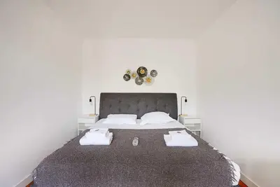 Un ou plusieurs lits dans un hébergement de l'établissement Chic apartment - 1BR-4P - Next to Paris