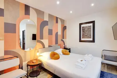 Un ou plusieurs lits dans un hébergement de l'établissement Magnificent studio - 2P - Levallois-Perret