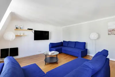 Coin salon dans l'établissement Pick A Flat's Apartment in Champs-Elysées - Rue Ponthieu