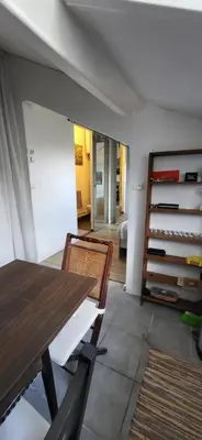 Coin salon dans l'établissement Cosy studio Clichy Levallois