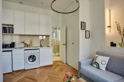 Cuisine ou kitchenette dans l'établissement Studio Arc de Triomphe by Studio prestige