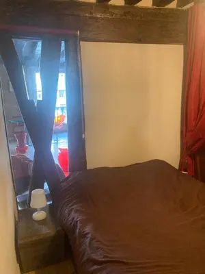 Un ou plusieurs lits dans un hébergement de l'établissement Appartement Saint-Paul Le Marais