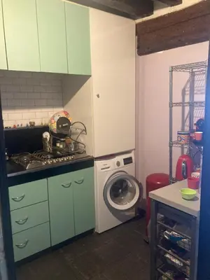 Cuisine ou kitchenette dans l'établissement Appartement Saint-Paul Le Marais