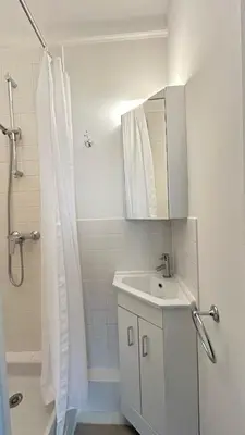 Salle de bains dans l'établissement Coquet Studio Paris 14ème