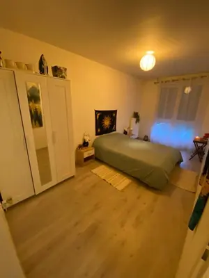 Un ou plusieurs lits dans un hébergement de l'établissement Appartement meublé et cosy