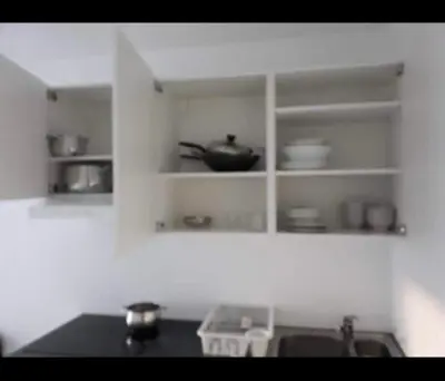 Cuisine ou kitchenette dans l'établissement Appartement meublé et cosy