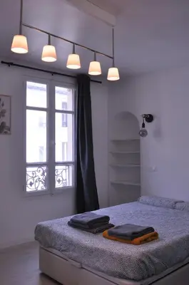 Un ou plusieurs lits dans un hébergement de l'établissement Appt Paris11 Charonne