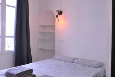 Un ou plusieurs lits dans un hébergement de l'établissement Appt Paris11 Charonne