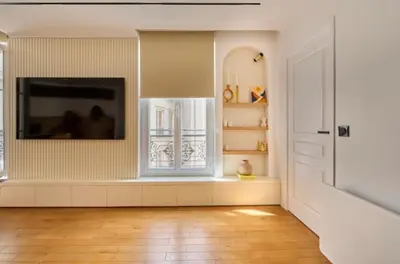 Télévision ou salle de divertissement dans l'établissement Elegant central flat in Paris, near Saint Germain