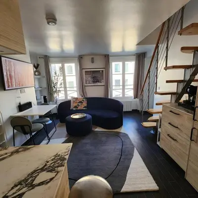 Coin salon dans l'établissement Le Moka - Duplex Lumineux - By Mon Petit Faré