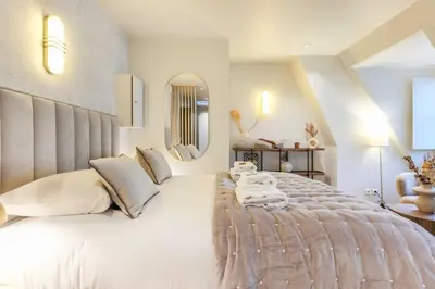 Un ou plusieurs lits dans un hébergement de l'établissement Chic studio - 2P - Arc de Triomphe
