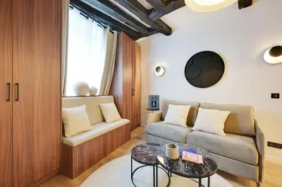 Coin salon dans l'établissement Chic apartment - 1BR-4P -AC- Marais-Vosges
