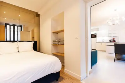 Un ou plusieurs lits dans un hébergement de l'établissement Loft 1 BR jardin des plantes AC by LCC Agency