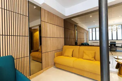 Coin salon dans l'établissement Loft 1 BR jardin des plantes AC by LCC Agency