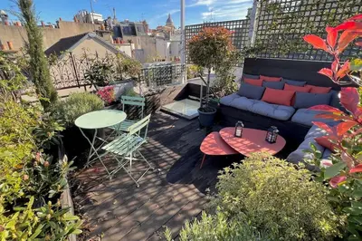 Coin salon dans l'établissement Rooftop Triplex with Garden at Notre Dame